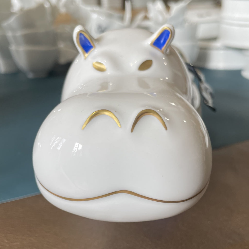 Hippopotame en porcelaine de limoges de la manufacture la seynie et structure en email les emaux arediens